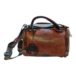 Elegant Brown Handbag with Floral Accent